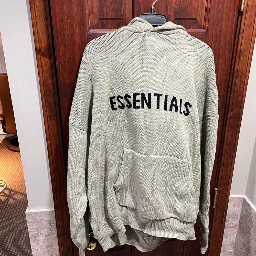 Essentials Fear of God knit hoodie.